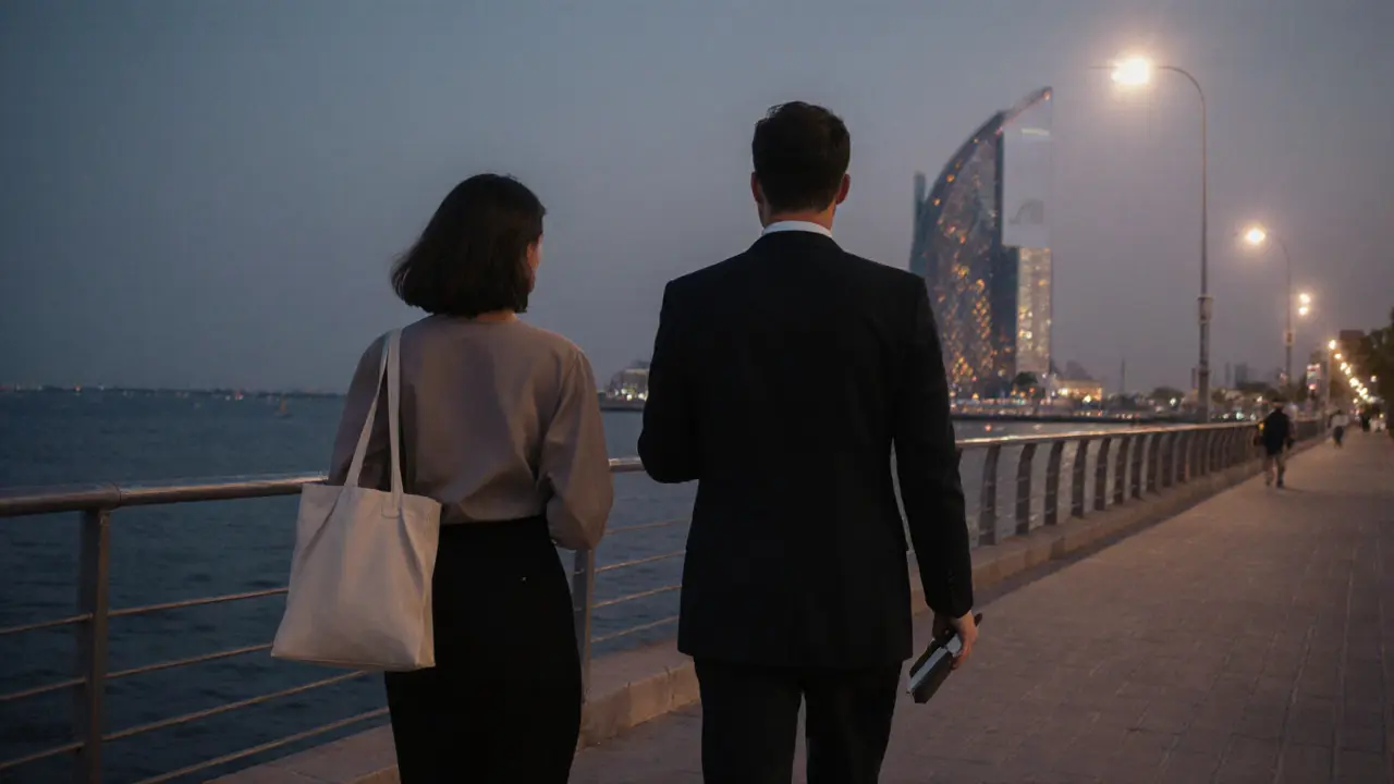 A couple walking peacefully along Abu Dhabi&#039;s Corniche at twilight near the Louvre.